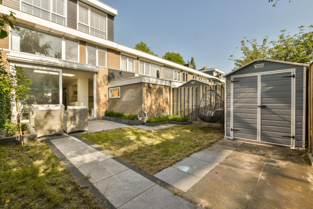 Minimalūs atstumai nuo ūkinio pastato iki sklypo ribos